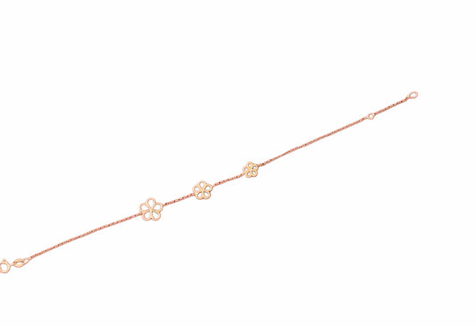 Pulsera de Oro 18K con Tres Flores – Delicadeza y Elegancia Natural